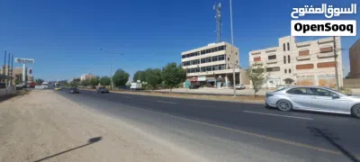 ارض مع مجمع تجاري 4