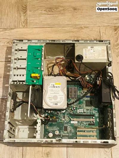 المنتج هو وحدة إمداد طاقة (Power Supply) من شركة HP لجهاز كمبيوتر مكتبي. 3