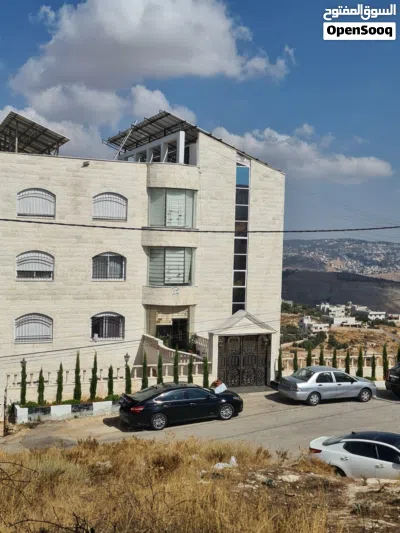 عمارة سكنية شارع الستين وليست اسكانات خمس طوابق وتسوية شقق طابقية كل شقة طابق مساحة كل شقة 266 متر 3