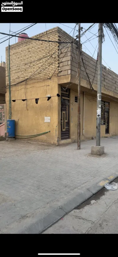 عقار للبيع موقع تجاري مساحه 54 متر واجهه 13متر ونص ونزال 4مترمكان كربلاء حي الامين مقابل دور القضاة 2