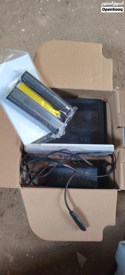 طابعة كانون SELPHY CP1500 3