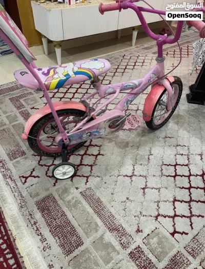 دراجة اطفال صغيرة لونها بنك حالتها جيدة جدا 3