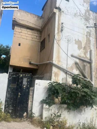 بيت للبيع بسعر مغري طابقين و تسويه 2