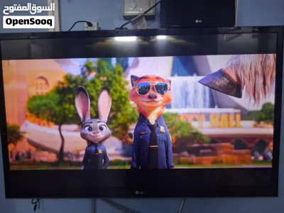 LG TV AND 5.1 SYSTEM 2