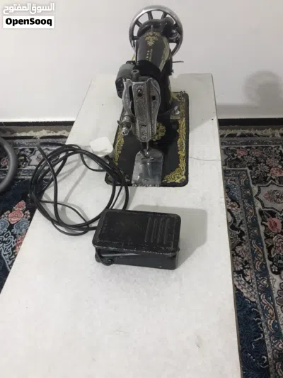 مكينة خياطه مع جهاز اوفر 2