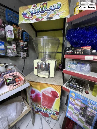 ماكينة تبريد عصائر + طاولة خاصة بها 3