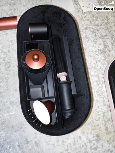 Dyson Airwrap i.d.TM multi-styler and dryer Straight+Wavy in Strawberry bronze and blush pink 3