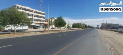 ارض مع مجمع تجاري 2