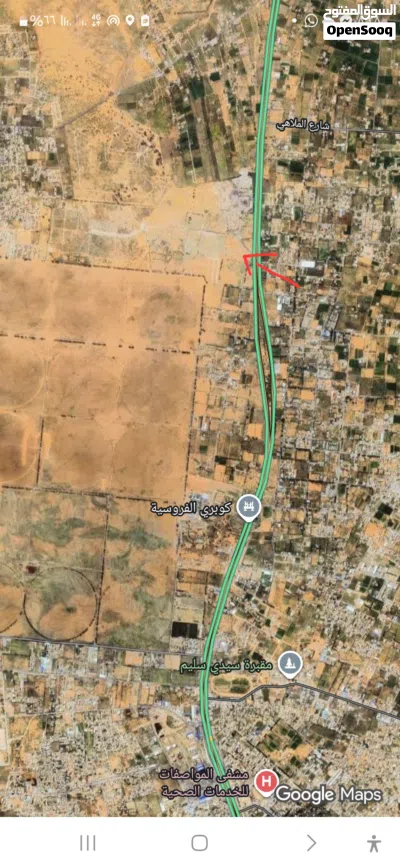 ارض هكتارين و 9000متر جنب الرئيسي طريق مطار 3