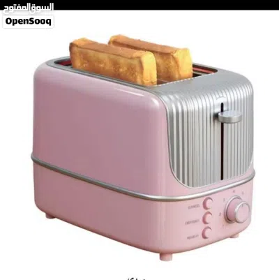 حمّاصة خبز كهربائية لشريحتين (2-Slice Toaster) بلون وردي وتصميم ريترو مميز، تبلغ قدرتها الكهربائ 4