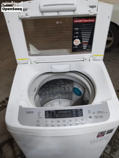 LG washing machine fully automatic 13kg good condition and working properly good with warranty with 4