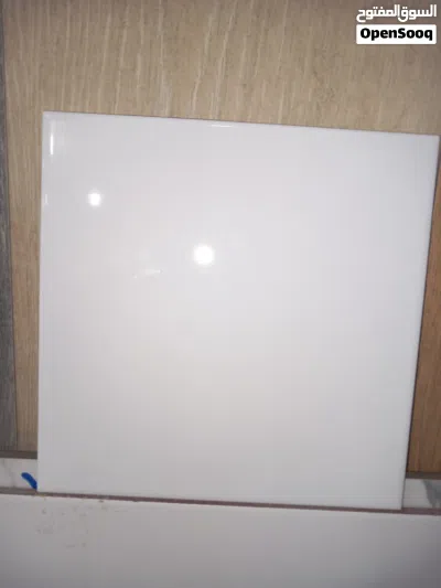 بورسلين ايطالى لون ابيض 40×40 أرضية خارجى وبوستين اسبانى 45×45 لون بيجى وارصاصى على 38 2