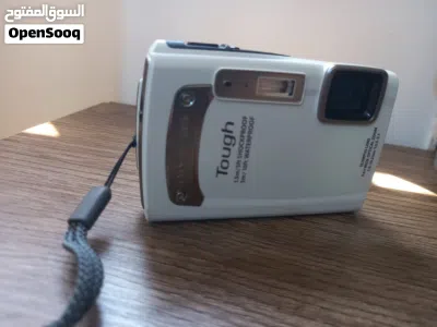 كاميرا Olympus Tough TG-310 بحالة الوكالة ومع وصلة الشاحن الاصلية. 2