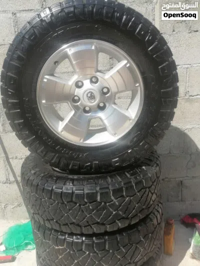 اطارات مع رنجات اصليه أمريكيه ممتازه جدا 2
