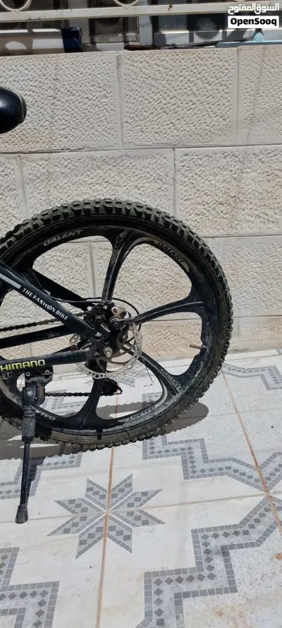 بسكليت جنط 24 نوعية GALANT بحالة الوكالة مع غيارات سباق وبركين 2