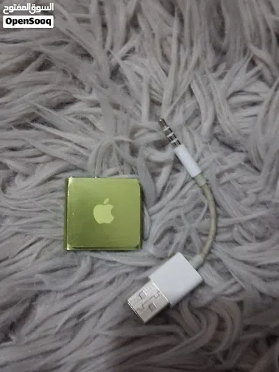 iPod Shuffle 4th Gen أصلي لون أخضر مميز - مع شاحنه الأصلي ونظيف جداً 3