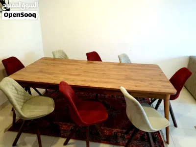 A unique 8-seater dining table with 360-degree swivel chairs 3