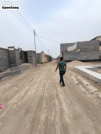 قطعة ارض 200 متر واجهة 10 نزال 20 الجزيرة الريان مقابيل ملعب الريان مسيجة كاملة طابوك ودنگ مثل ماموض 4