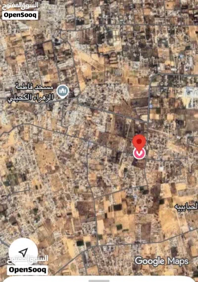 أرض في عين زارة للبيع 2