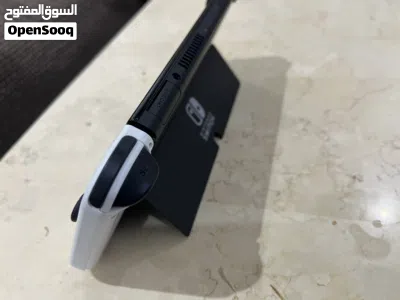 Nintendo Switch OLED 2021 ننتندو سويتش أوليد نظيف جداً + 5 ألعاب + حقيبة 4