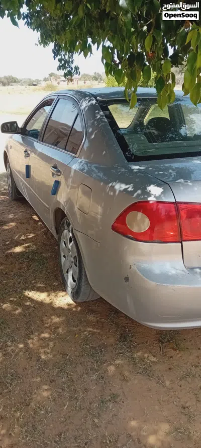كيا اوبتيما EX 2