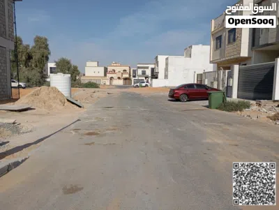 ارض سكني 200 متر زاوية شارعين منطقة الزاهيةResidential land, 200 sqm, corner plot on two streets, 2