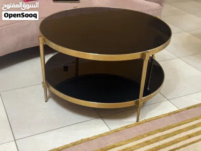 Elegant Modern Coffee Table – Black Glass with Gold Finish 3