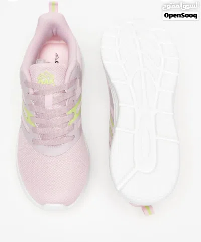 Textured lace-up sport shoes with cushioning. Contrasting toned panel details. 4