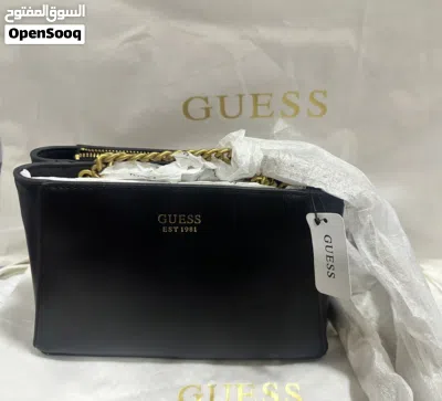Guess Massie Mini Double cross Bag Discounted before 55 now for only 50 riyals. 2