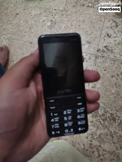 هاتف جديد كبسات لون أسود 4
