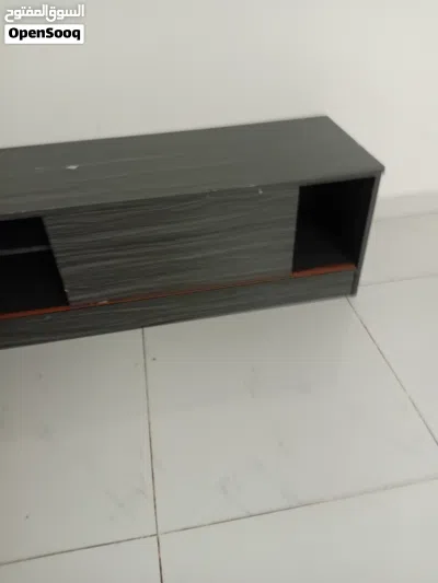 grey TV table stand moving storage and shelves طاولة تلفزيون رماديه بتخزين ورف 2