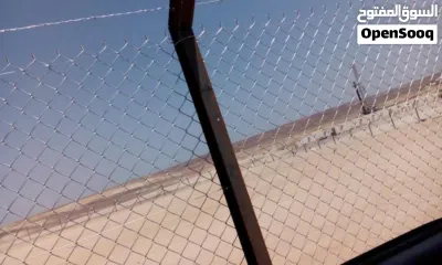 لتشييك لاراضي وبناء السلاسل و تعبيد الطرق و زراعة الأشجار و نصب الملاعب الرياضيه 2
