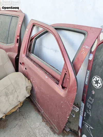 خمس ابواب نيسان اكستيرا 2010 بابين قدام وبابين ورا و باب دبة Nissan Xterra doors لون احمر 2