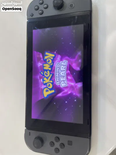 NINTENDO SWITCH BLACK with Pokémon shining pearl and accessories 3