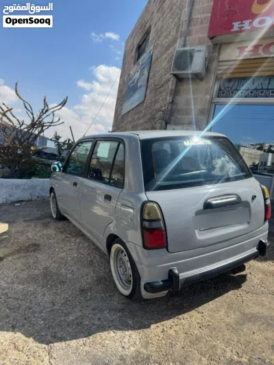 Daihatsu Mira 4