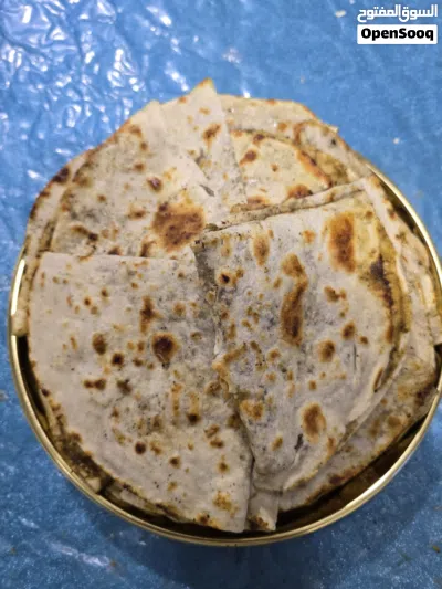 خبز صاج مهياوة بالزبدة او زيت زيتون او دهن عداني مهياوة اجار ثوم يبل مع طماط او بدون طماط كيلو 25حبة 2