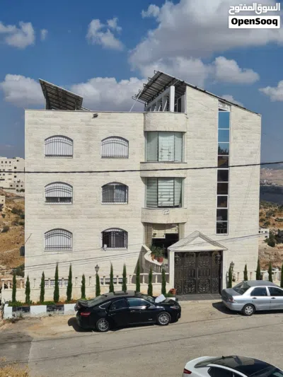 عمارة سكنية شارع الستين وليست اسكانات خمس طوابق وتسوية شقق طابقية كل شقة طابق مساحة كل شقة 266 متر 4