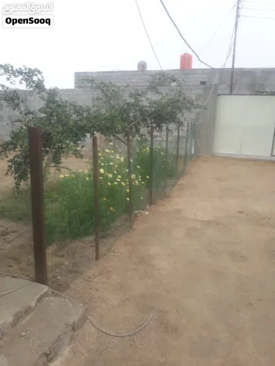 دونم مع ثلاث بيوت وديوان خارجي 3