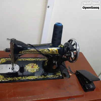 ماكينه خياطه ملابس نوع سنجر بحاله ممتازه بسعر مغري 50 قابل للتفاوض 2
