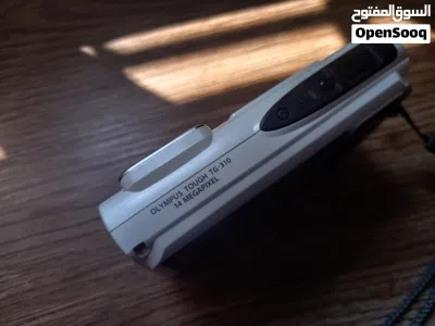 كاميرا Olympus Tough TG-310 بحالة الوكالة ومع وصلة الشاحن الاصلية. 3