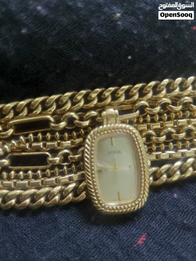 ساعه يد نسائي ماركه GUESS مطليه ذهب كلاسيكيه 4