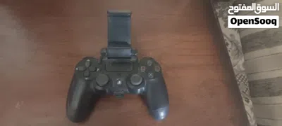 يد بلايستيشن 4 مع المسكة جوال 2