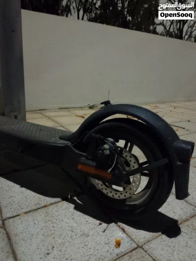 {CHEAP ELECTRIC SCOOTER} in very good condition 50 OMR only for teenagers are adults 3