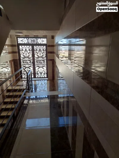 شقه ارضيه حديثه + حديقه+ كراج+ طراز امامي له اطلاله على شارع الاردن 2