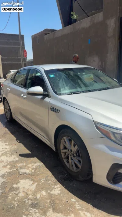 کیا ئوپتیما EX 3