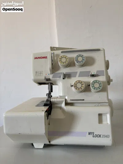 JUKI DDL-5550 Sewing machine And Janome MyLock 204D overlock (serger) machine. 2