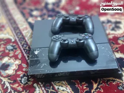 جهاز PS4 Fat شبه جديد + 2 يد وكالة – نظيف جدًا وجاهز للعب 3