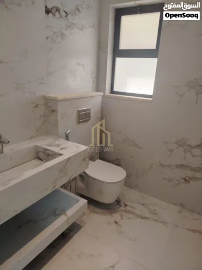 في عبدون وبالقرب من السفارة الامريكيه شقة شبه ارضي 240م تحت الإنشاء / ref 1363 4