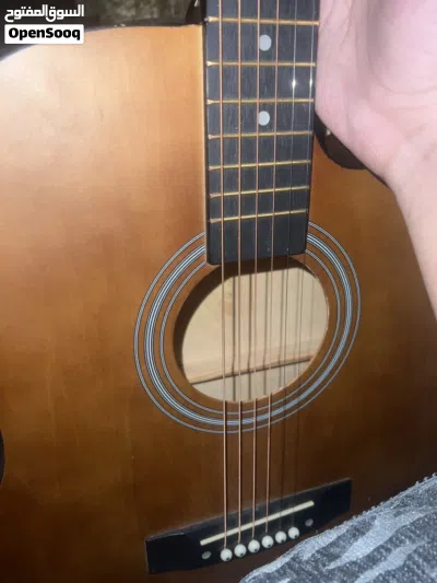 Beginner Acoustic Guitar With brand new strings capo, a little damaged bag, plectrums, and more 2