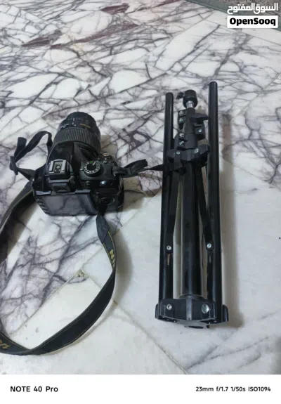 كامرة نيكون D3200 مع ستان نقصها عدسة بس ابيع على وضعها 4